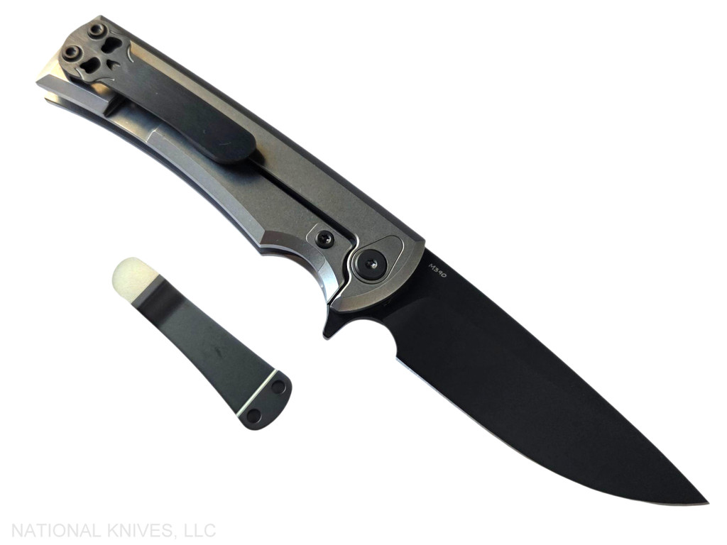 Chaves Knives Liberation Street Integral folding knife featuring a flipper tab - shown open lock side.  Black DLC M390 stainless steel drop point style plain edge blade.  Bright stonewash titanium handle.  Model CK-2B1-1G1A-11A0!