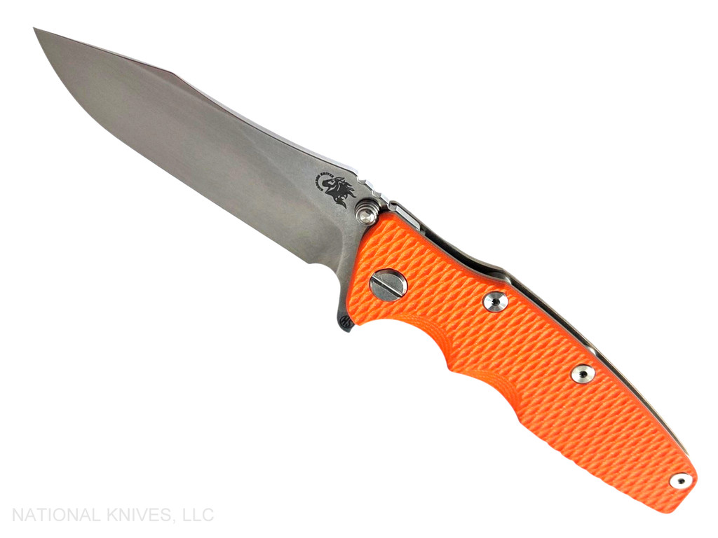 Rick Hinderer Knives Skinny Eklipse Slicer folding knife with flipper tab - shown open - presentation side.  Stonewash 3.5" hollow grind MagnaCut stainless steel plain edge blade.  Orange G-10 handle scale with stonewash bronze lock side.  Model KEK35SKSLHO