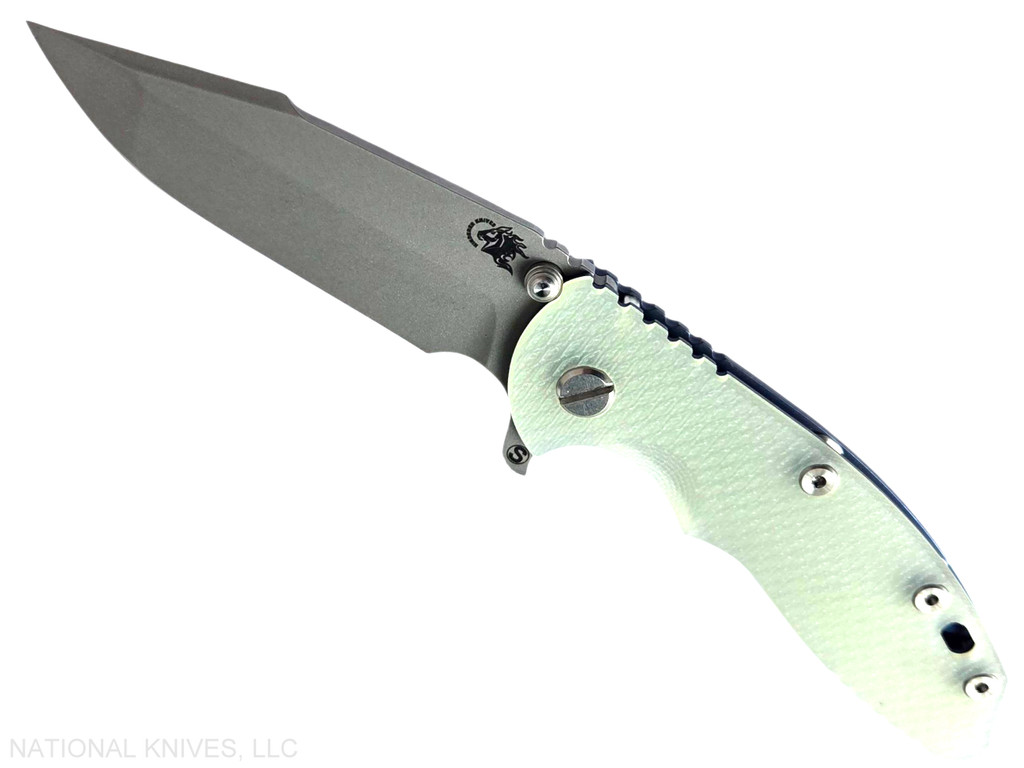 Rick Hinderer Knives XM-18 Skinny Harpoon Spanto with thumb stud and flipper tab - shown open presentation side.  Working Finish MagnaCut stainless steel plain edge blade.  Translucent Green G-10 handle with Battle Blue lock side.  Model KXM35SKHS.
