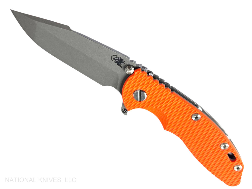 Rick Hinderer Knives XM-18 Skinny Harpoon Spanto with thumb stud and flipper tab - shown open presentation side.  Working Finish MagnaCut stainless steel plain edge blade.  Orange G-10 handle with Working Finish lock side.  Model KXM35SKHS.