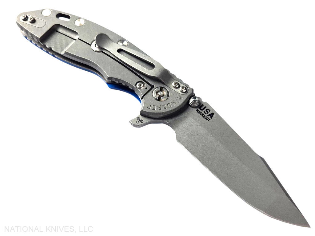 Rick Hinderer Knives XM-18 3.5" Harpoon Spanto folding knife with thumb stud and flipper tab - shown open lock side.  Working Finish MagnaCut stainless steel plain edge blade.  Blue G-10 handle with Working Finish lock side.  Model KXM35HS.