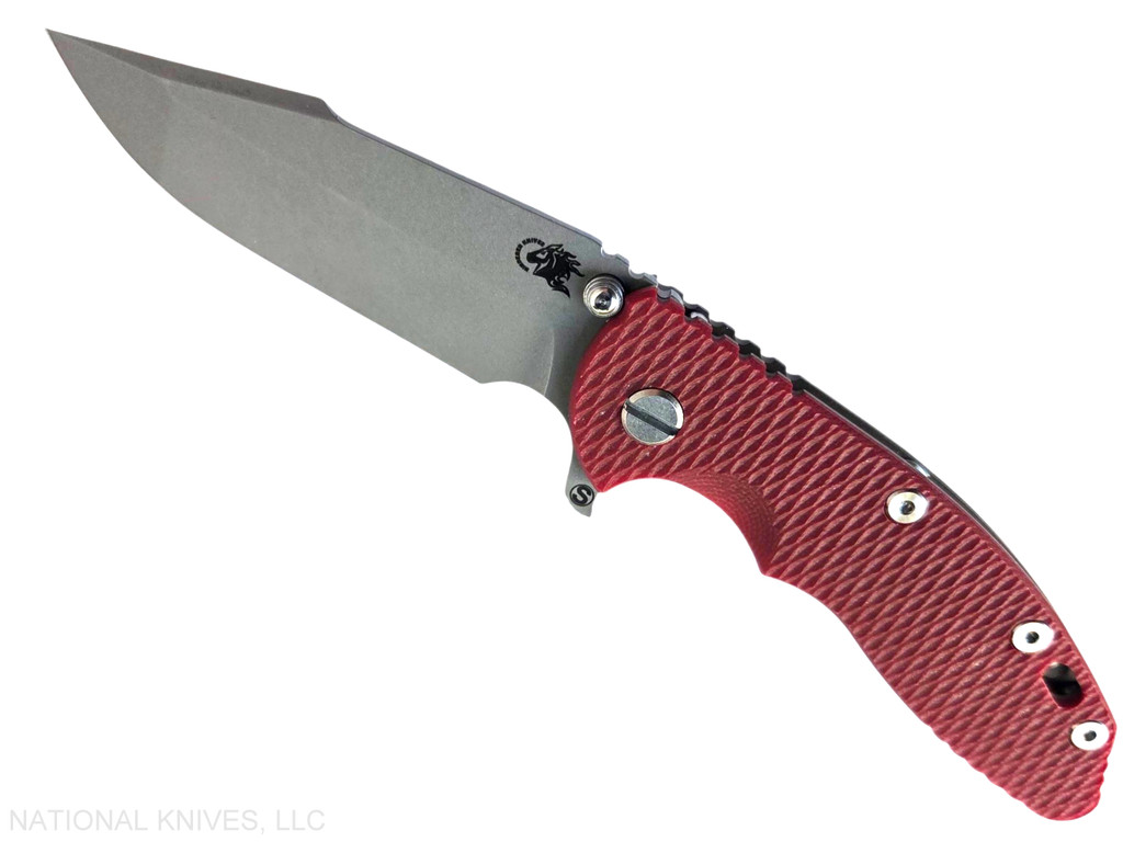 Rick Hinderer Knives XM-18 Skinny Harpoon Spanto with thumb stud and flipper tab - shown open presentation side.  Working Finish MagnaCut stainless steel plain edge blade.  Red G-10 handle with Battle Bronze lock side.  Model KXM35SKHS.