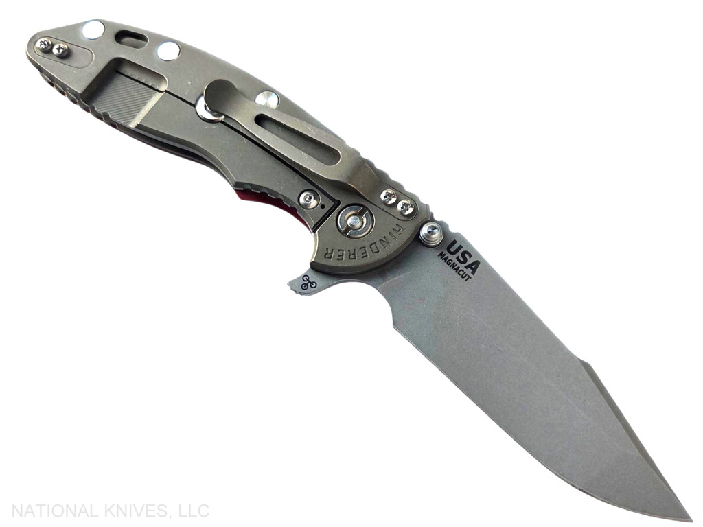 Rick Hinderer Knives XM-18 Skinny Harpoon Spanto with thumb stud and flipper tab - shown open lock side.  Working Finish MagnaCut stainless steel plain edge blade.  Red G-10 handle with Battle Bronze lock side.  Model KXM35SKHS.
