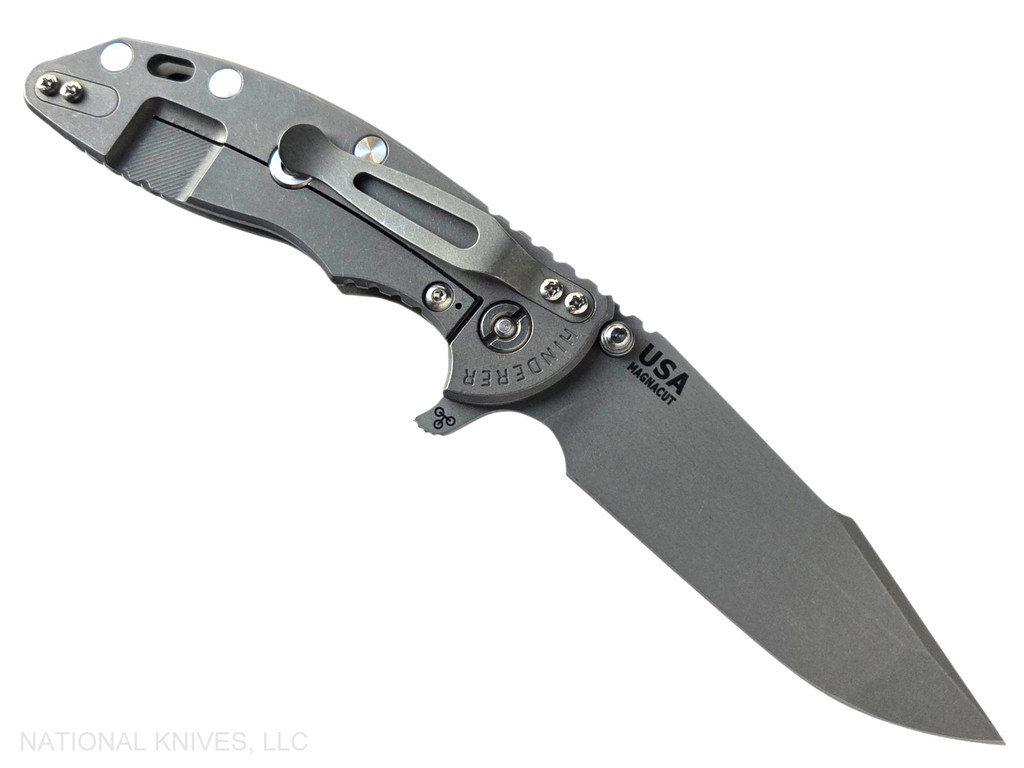 Rick Hinderer Knives XM-18 Skinny Harpoon Spanto with thumb stud and flipper tab - shown open lock side.  Working Finish MagnaCut stainless steel plain edge blade.  OD Green G-10 handle with Working Finish lock side.  Model KXM35SKHS.