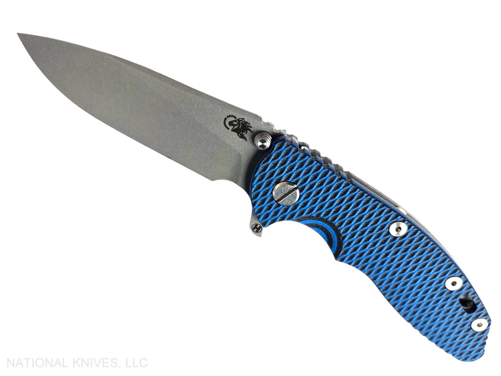Rick Hinderer Knives XM-18 3.5" Slicer Hollow Grind folding knife with thumb stud and flipper tab - shown open presentation side.  Working Finish 20CV stainless steel plain edge blade.  Blue - black G-10 handle with Working Finish lock side.  Model KXM35SLHO.