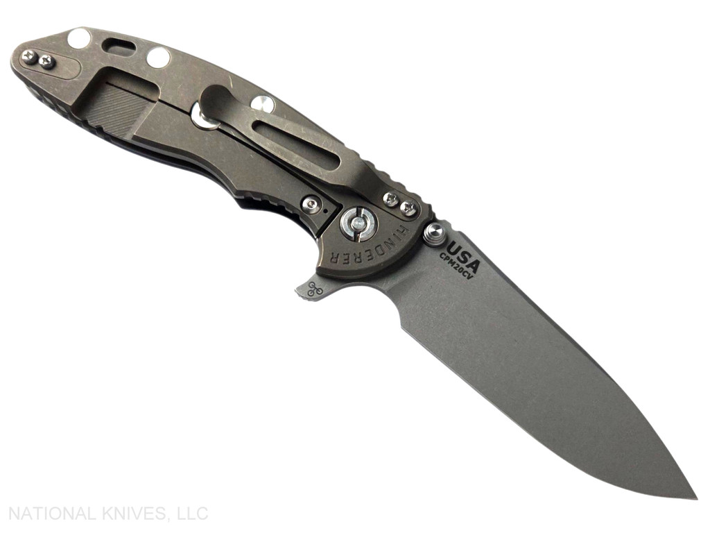 Rick Hinderer Knives XM-18 3.5" Slicer Hollow Grind folding knife with thumb stud and flipper tab - shown open lock side.  Working Finish 20CV stainless steel plain edge blade.  Blue - black G-10 handle with Battle Bronze lock side.  Model KXM35SLHO.