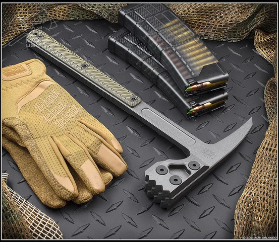 RMJ Tactical Cuddles Tactical Hammer - shown out of sheath reverse.  Tungsten Cerakote 80CRV2 steel head.  Dirty Olive G-10 handle.  