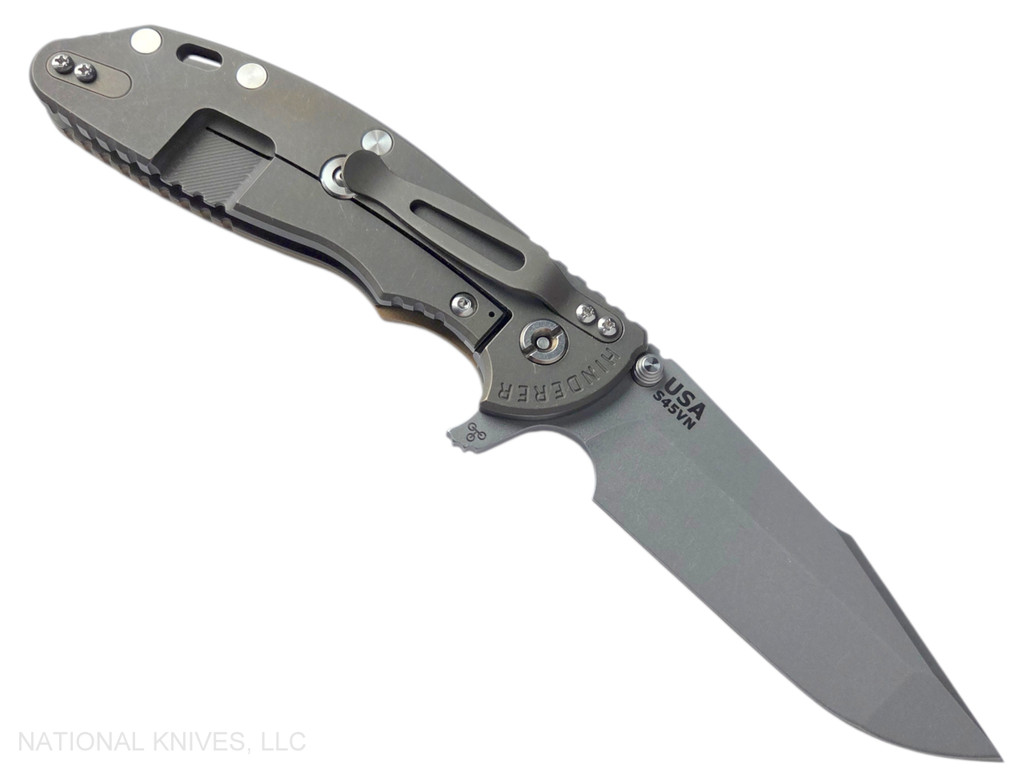 Rick Hinderer Knives XM-24 Harpoon Spanto folding knife with thumb stud and flipper tab - shown open lock side.  Working Finish S45VN stainless steel plain edge blade.  Coyote G-10 handle with Battle Bronze lock side.  Model KXM40HS.