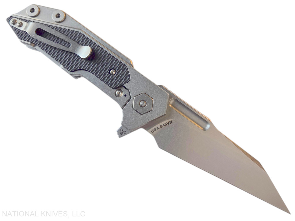 Rick Hinderer Knives Full Track Wharncliffe folding knife with flipper tab - shown open lock side.  Stonewash S45VN stainless steel plain edge blade.  Stonewash titanium with black G-10 scales.  Model KFTRWC.
