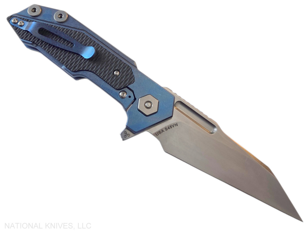 Rick Hinderer Knives Full Track Wharncliffe folding knife with flipper tab - shown open lock side.  Stonewash S45VN stainless steel plain edge blade.  Stonewash blue titanium with black G-10 scales.  Model KFTRWC.