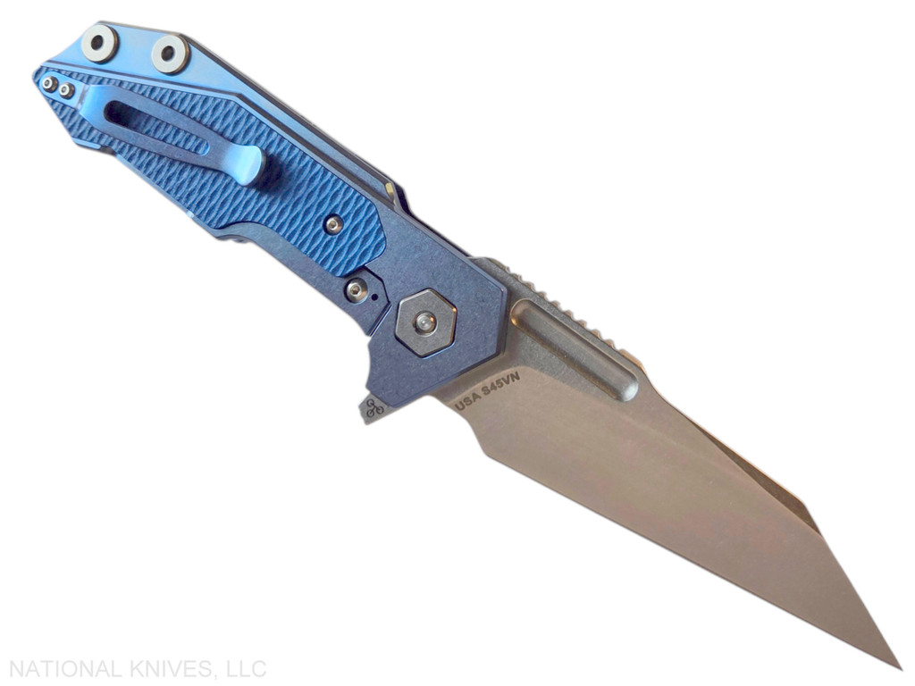 Rick Hinderer Knives Full Track Wharncliffe folding knife with flipper tab - shown open lock side.  Stonewash S45VN stainless steel plain edge blade.  Stonewash blue titanium with blue G-10 scales.  Model KFTRWC.
