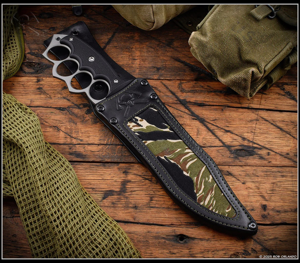 RMJ Tactical Marauder - shown in sheath obverse. Savage Stainless Cerakote 3V steel plain edge blade.  Black G-10 handle scales.  Model K-MD-3V-SS-BLK-BLK/VT.