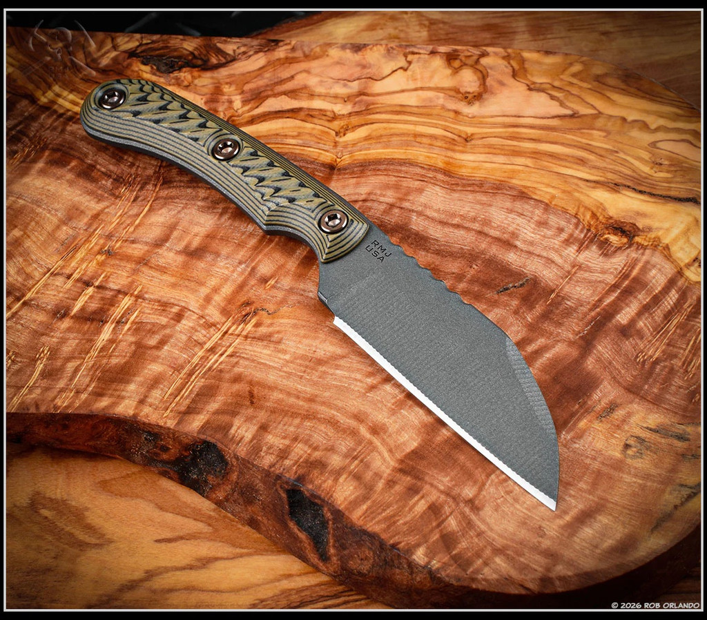 RMJ Tactical Coho fixed blade knife - shown out of sheath obverse.  Tungsten Cerakote MagnaCut stainless steel plain edge blade.  Dirty Olive G-10 handle.  Model K-CO-MC-TU-DO.