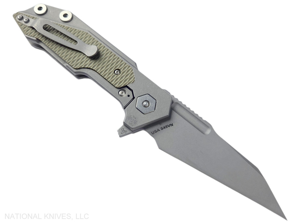 Rick Hinderer Knives Full Track Wharncliffe folding knife with flipper tab - shown open lock side.  Working Finish S45VN stainless steel plain edge blade.  Working Finish titanium with OD green G-10 scales.  Model KFTRWC.