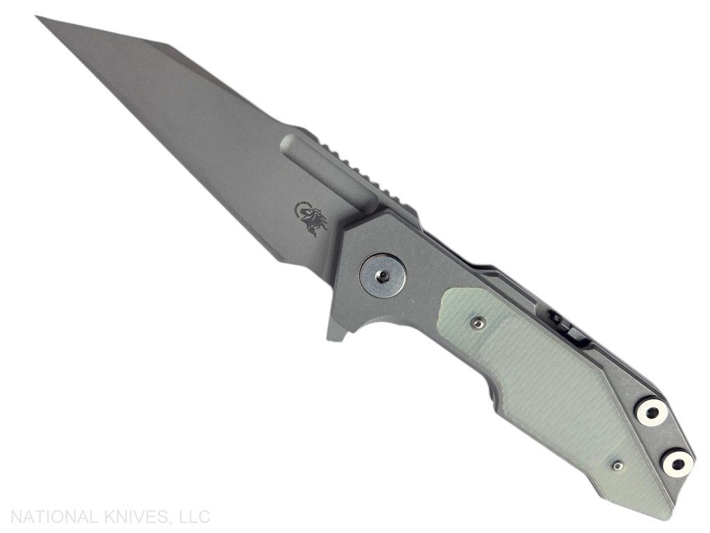 Rick Hinderer Knives Full Track Wharncliffe folding knife with flipper tab - shown open presentation side.  Working Finish S45VN stainless steel plain edge blade.  Working Finish titanium with Translucent Green G-10 scales.  Model KFTRWC.