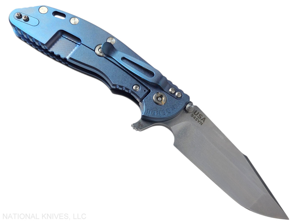 Rick Hinderer Knives XM-24 Harpoon Spanto folding knife with thumb stud and flipper tab - shown open lock side.  Stonewash S45VN stainless steel plain edge blade.  Black G-10 handle with stonewash blue lock side.  Model KXM40HS.