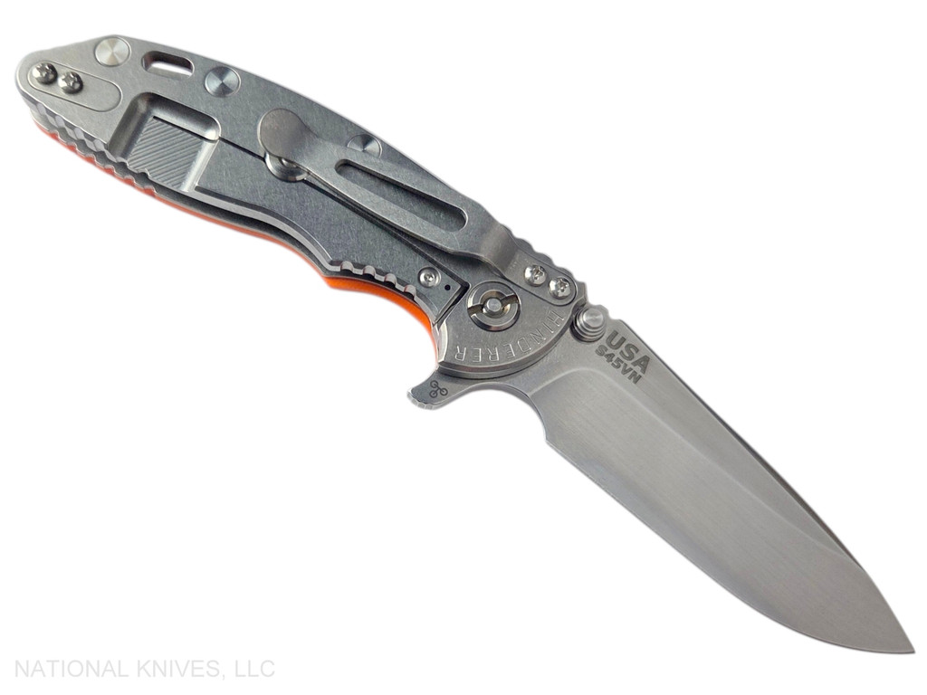 Rick Hinderer Knives XM-18 3.25" Spear Point folding knife with thumb stud and flipper tab - shown open lock side.  Stonewash S45VN stainless steel plain edge blade.  Orange G-10 handle with stonewash lock side.  Model KXM325SPE.