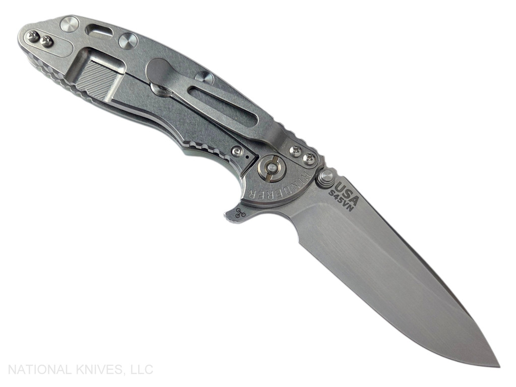 Rick Hinderer Knives XM-18 3.25" Spear Point folding knife with thumb stud and flipper tab - shown open lock side.  Stonewash S45VN stainless steel plain edge blade.  Translucent Green G-10 handle with stonewash lock side.  Model KXM325SPE.