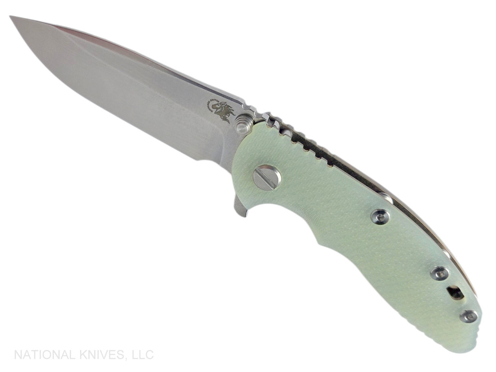 Rick Hinderer Knives XM-18 3.25" Spear Point folding knife with thumb stud and flipper tab - shown open presentation side.  Stonewash S45VN stainless steel plain edge blade.  Translucent Green G-10 handle with stonewash bronze lock side.  Model KXM325SPE.