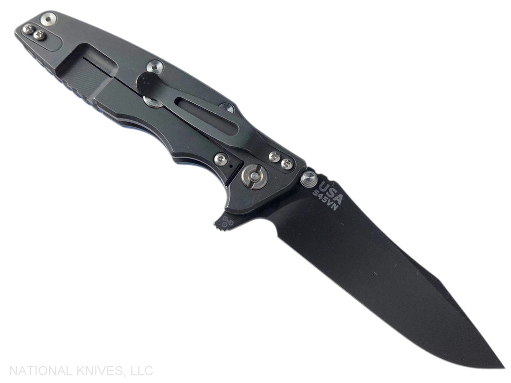 Rick Hinderer Knives Eklipse Spear Point folding knife with flipper tab and thumb stud - shown open lock side.  Battle Black S45VN stainless steel plain edge blade.  Blue G-10 handle with Battle Black lock side.  Model KEK35SPEDLC.