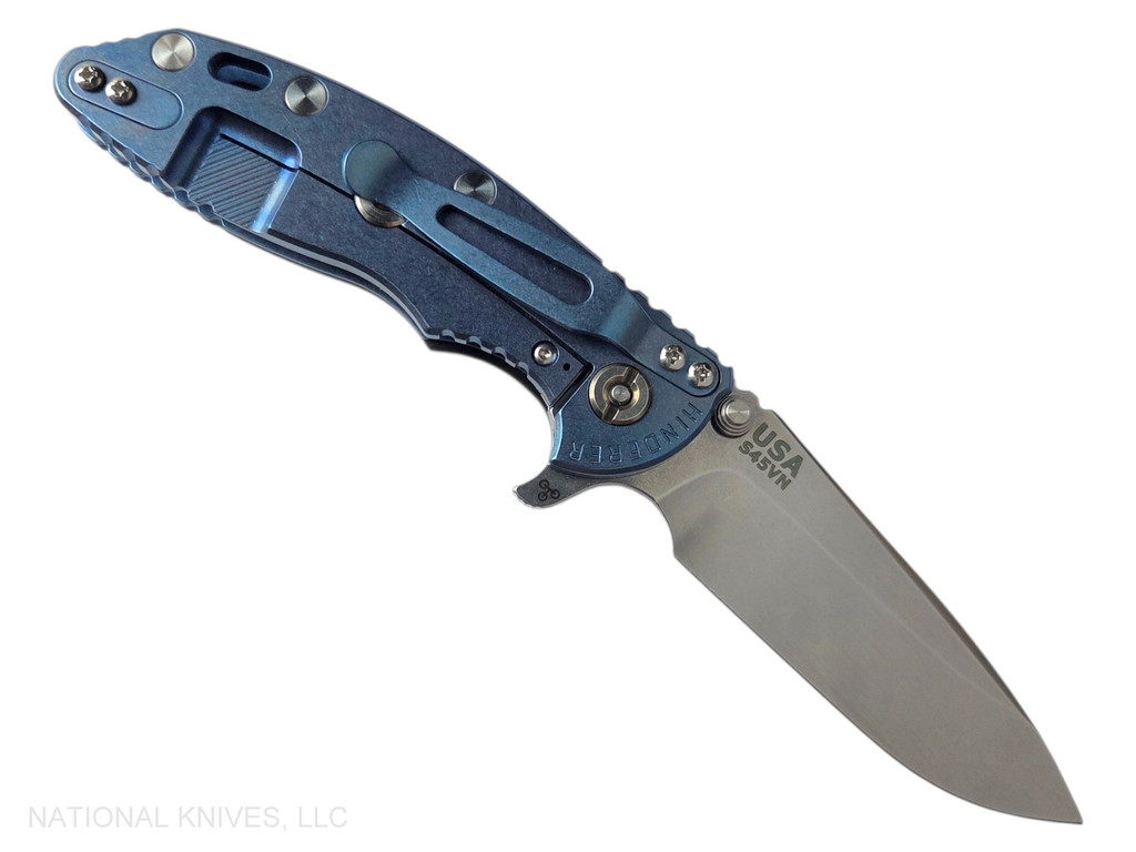 Rick Hinderer Knives XM-18 3.25" Spear Point folding knife with thumb stud and flipper tab - shown open lock side.  Stonewash S45VN stainless steel plain edge blade.  Blue - black G-10 handle with stonewash blue lock side.  Model KXM325SPE.