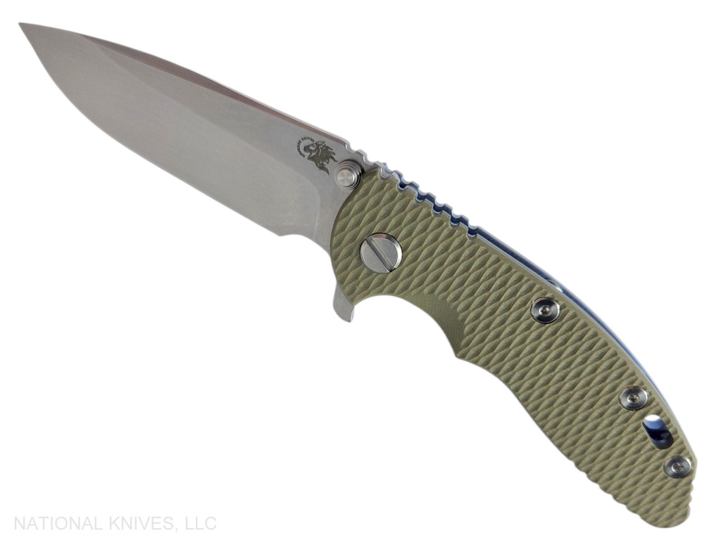 Rick Hinderer Knives XM-18 3.25" Spear Point folding knife with thumb stud and flipper tab - shown open presentation side.  Stonewash S45VN stainless steel plain edge blade.  OD green G-10 handle with stonewash blue lock side.  Model KXM325SPE.