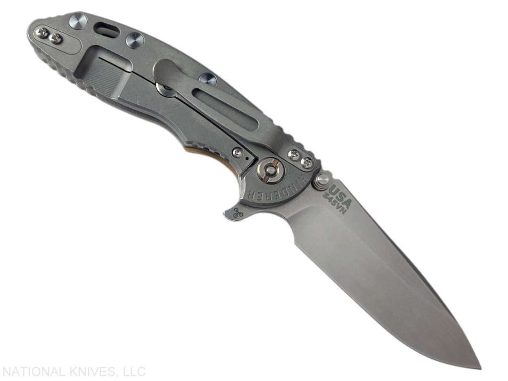 Rick Hinderer Knives XM-18 3.25" Spear Point folding knife with thumb stud and flipper tab - shown open lock side.  Stonewash S45VN stainless steel plain edge blade.  Coyote G-10 handle with Working Finish lock side.  Model KXM325SPE.