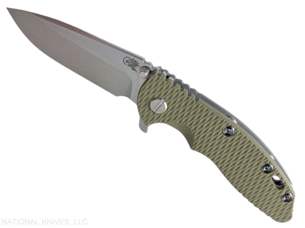 Rick Hinderer Knives XM-18 3.25" Spear Point folding knife with thumb stud and flipper tab - shown open presentation side.  Stonewash S45VN stainless steel plain edge blade.  OD green G-10 handle with Working Finish lock side.  Model KXM325SPE.