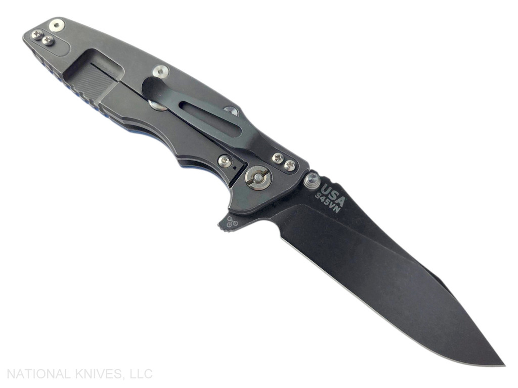 Rick Hinderer Knives Eklipse folding knife with flipper tab - shown open - lock side.  Battle Black 3.5" hollow grind S45VN stainless steel plain edge blade.  Blue G-10 handle scale with Battle Black lock side.  Model KEK35SLHODLC.