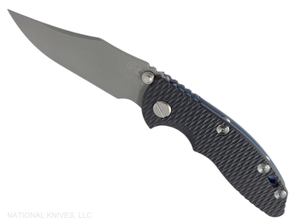 Rick Hinderer Knives XM-18 3.0" Non Flipper Bowie folding knife with thumb stud - shown open presentation side.  Working Finish 20CV stainless steel plain edge blade.  Black G-10 handle with Battle Blue lock side.  Model KXM30BOWNF.