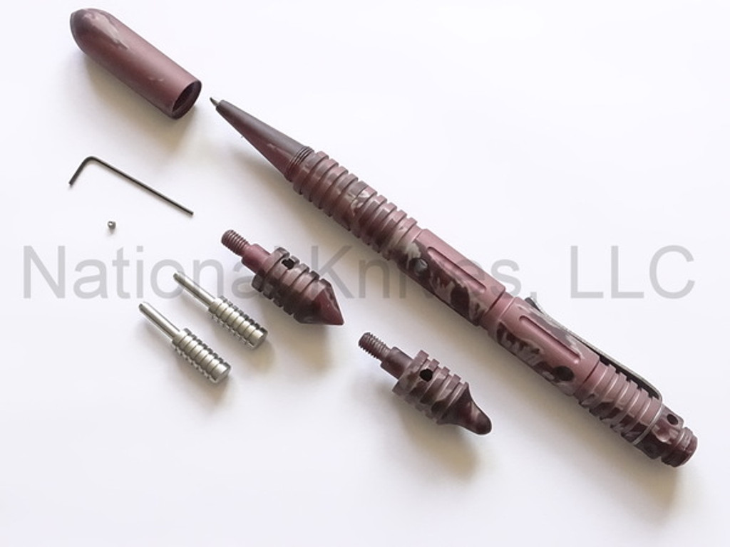 Rick Hinderer Knives Modular Kubaton ink pen set - shown cap off with accessories.  Pink Camo aluminum construction.  
For reference only.
