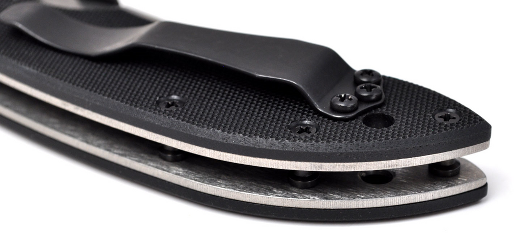 Emerson Knives Mini Commander SF folding knife with thumb disk and Emerson Wave opener - close up of pocket clip shown.  Satin 154CM stainless steel plain edge blade.  Black G-10 handle.  Model M-COM-SF.