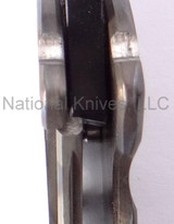 Medford Knives Praetorian folding knife with thumb groove - close up of lock shown.  Black Oxide D2 steel plain edge blade.  Flame anodized titanium handle.  Model MK12DPT-03FL.
For reference only. Medford Knives Praetorian folding knife with thumb groove - close up of lock shown.  Black Oxide D2 steel plain edge blade.  Flame anodized titanium handle.  Model MK12DPT-03FL.
For reference only.