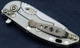 Rick Hinderer Knives Holey Pocket Clip and Filler Tab Set- shown installed on knife. Anodized Bronze titanium construction.  Model K002010HO-BR.
For reference only
