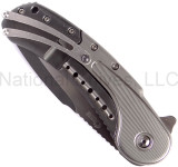 Todd Begg Knives Bodega 2.0 folding knife with flipper tab - shown closed pocket clip side.  2-tone N690 stainless steel plain edge blade.  Gray titanium handle.
For reference only.