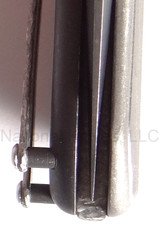 Todd Begg Knives Bodega 2.0 folding knife with flipper tab - shown close up of blade tip.  2-tone N690 stainless steel plain edge blade.  Gray titanium handle.
For reference only.