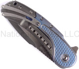 Todd Begg Knives Bodega 2.0 folding knife with flipper tab - shown closed pocket clip side.  2-tone N690 stainless steel plain edge blade.  Blue titanium handle.
For reference only.