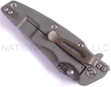 Rick Hinderer Knives Eklipse Tanto folding knife with thumb stud and flipper tab - shown closed lock side.  Stonewash S35VN stainless steel plain edge blade.  Black G-10 handle with Working Finish lock side.  Model K40040TD00.
For reference only.