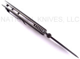 Emerson Knives CQC-7AW BTS folding knife with thumb disk and Emerson Wave opener - shown open top view.  Black 154CM stainless steel combo edge blade.  Black G-10 handle.  Model CQC-7AW-BTS.
For reference only.