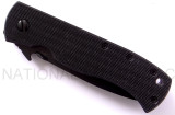 Emerson Knives CQC-7AW BTS folding knife with thumb disk and Emerson Wave opener - shown closed presentation side.  Black 154CM stainless steel combo edge blade.  Black G-10 handle.  Model CQC-7AW-BTS.
For reference only.