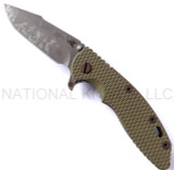 Rick Hinderer Knives Battlefield Pick Up XM-18 3.5" Harpoon Spanto folding knife with thumb stud and flipper tab - shown open presentation side.  M390 stainless steel plain edge blade.  OD green G-10 handle with titanium lock side.  Model K25520SP00.
For reference only.