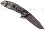 Rick Hinderer Knives Battlefield Pick Up XM-18 3.5" Harpoon Spanto folding knife with thumb stud and flipper tab - shown open lock side.  M390 stainless steel plain edge blade.  OD green G-10 handle with titanium lock side.  Model K25520SP00.
For reference only.