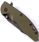 Rick Hinderer Knives Battlefield Pick Up XM-18 3.5" Harpoon Spanto folding knife with thumb stud and flipper tab - shown closed presentation side.  M390 stainless steel plain edge blade.  OD green G-10 handle with titanium lock side.  Model K25520SP00.
For reference only.