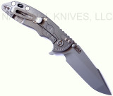Rick Hinderer Knives Stars and Bars XM-18 3.5" Harpoon Spanto folding knife with thumb stud and flipper tab - shown open lock side.  Bead Blast 20CV stainless steel plain edge blade.  Bead Blast titanium handle with Bead Blast lock side.  Model K25520SP00.
For reference only.