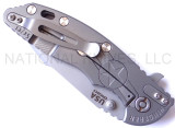 Rick Hinderer Knives Stars and Bars XM-18 3.5" Harpoon Spanto folding knife with thumb stud and flipper tab - shown closed lock side.  Bead Blast 20CV stainless steel plain edge blade.  Bead Blast titanium handle with Bead Blast lock side.  Model K25520SP00.
For reference only.