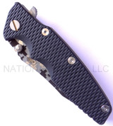 Rick Hinderer Knives Digi Camo Edition Eklipse Harpoon Tanto folding knife with thumb stud and flipper tab - shown closed presentation side.  Working Finish 20CV stainless steel plain edge blade.  Black G-10 handle with Battle Bronze lock side.  Model K40042S000.
For reference only.