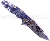 Rick Hinderer Knives Digi Camo Edition Eklipse Harpoon Tanto folding knife with thumb stud and flipper tab - shown open lock side.  Working Finish 20CV stainless steel plain edge blade.  Blue - black G-10 handle with Battle Blue lock side.  Model K40042S000.
For reference only.