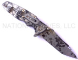 Rick Hinderer Knives Digi Camo Edition Eklipse Harpoon Tanto folding knife with thumb stud and flipper tab - shown open lock side.  Working Finish 20CV stainless steel plain edge blade.  Grey - black G-10 handle with Working Finish lock side.  Model K40042S000.
For reference only.