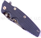 Rick Hinderer Knives Digi Camo Edition Eklipse Harpoon Tanto folding knife with thumb stud and flipper tab - shown closed presentation side.  Working Finish 20CV stainless steel plain edge blade.  Grey - black G-10 handle with Working Finish lock side.  Model K40042S000.
For reference only.