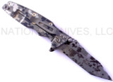 Rick Hinderer Knives Digi Camo Edition Eklipse Harpoon Tanto folding knife with thumb stud and flipper tab - shown open lock side.  Working Finish 20CV stainless steel plain edge blade.  OD green G-10 handle with Working Finish lock side.  Model K40042S000.
For reference only.